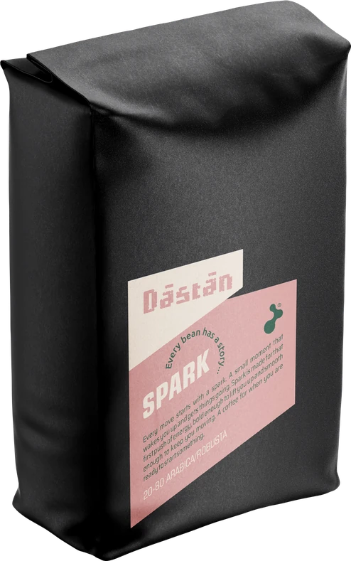 Black Dāstān Spark coffee bag with a pink label